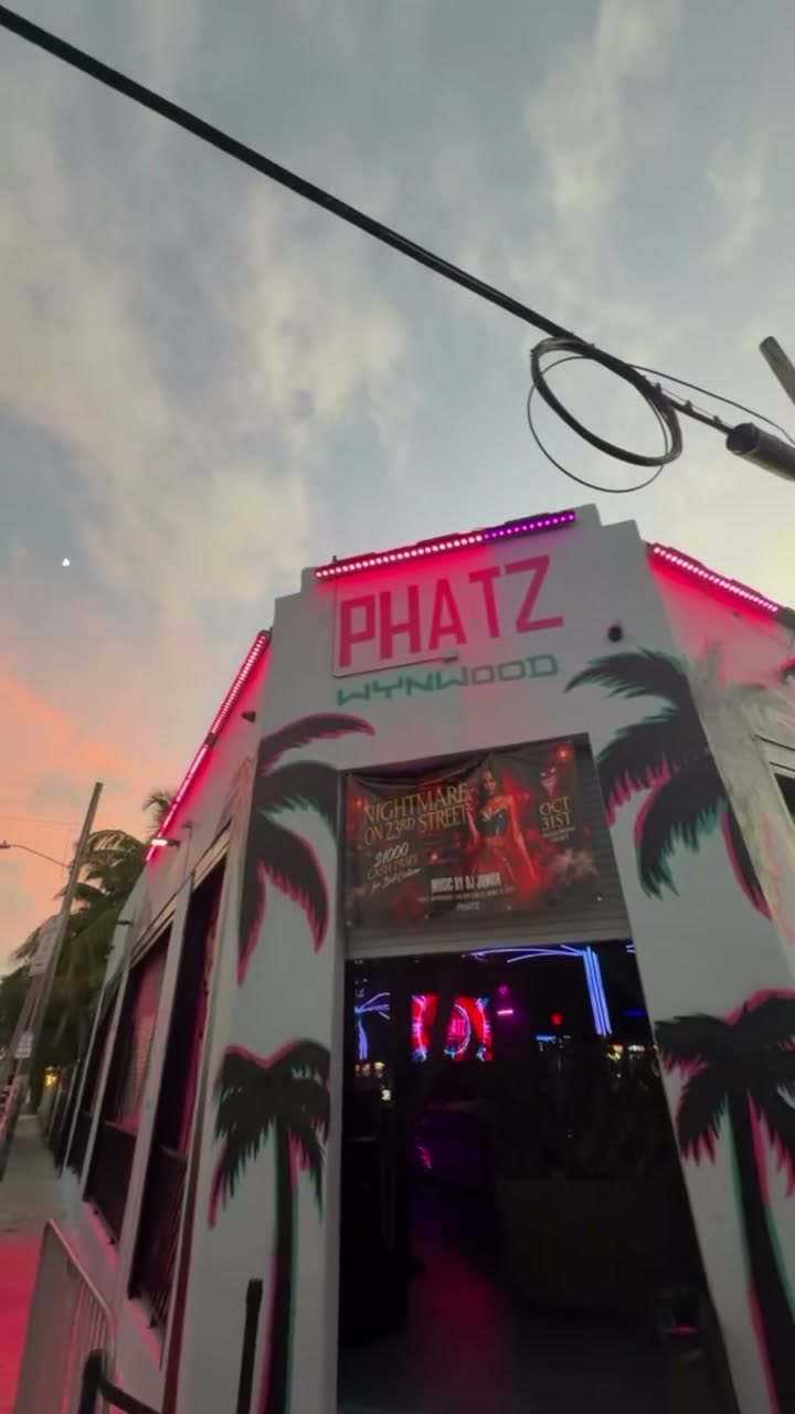 PHATZ Wynwood facade at dusk with neon pink trim